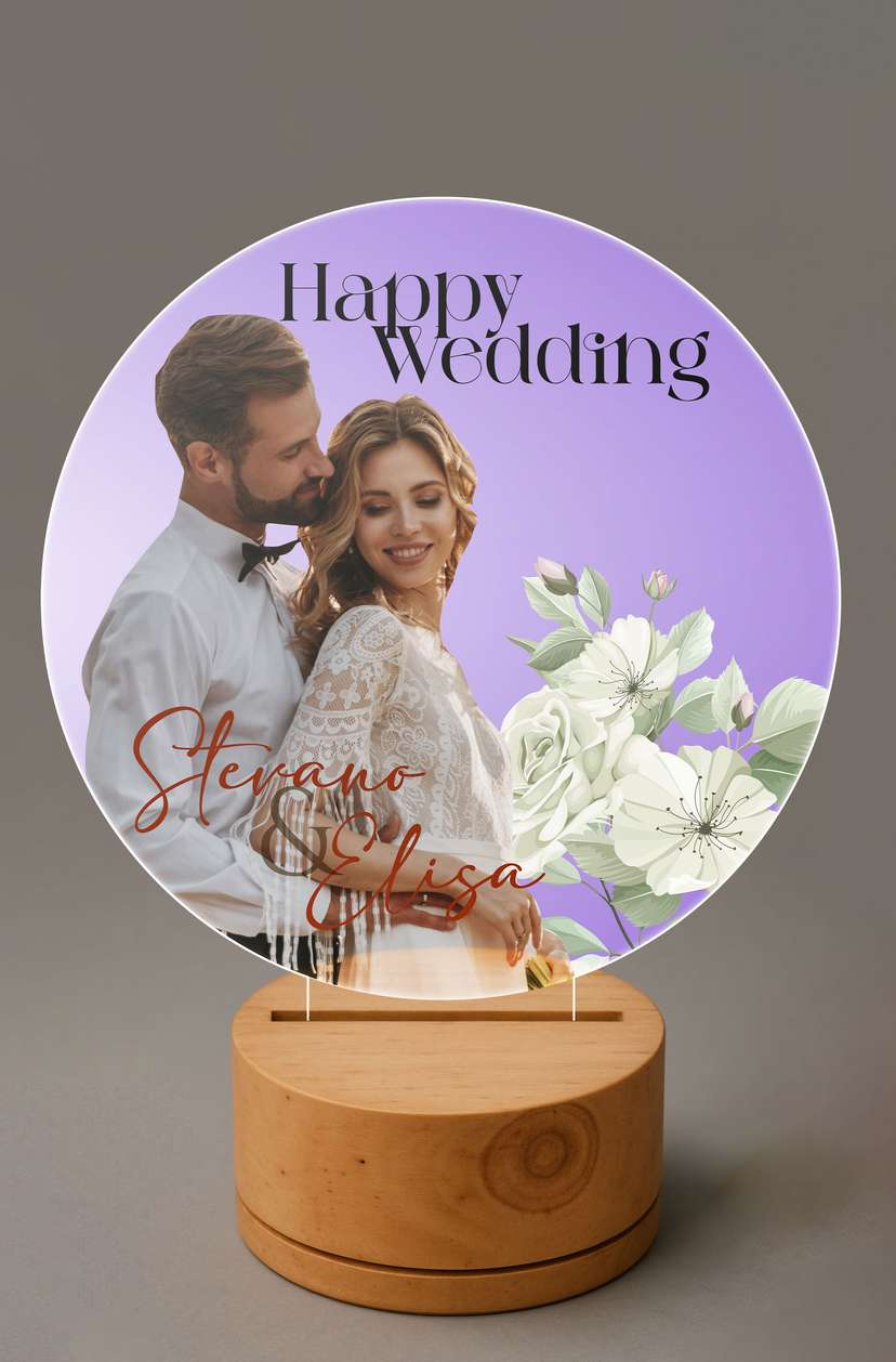 Dream LED Wedding Couple Elegant dengan Background Ungu dan Bunga Putih - Image 1